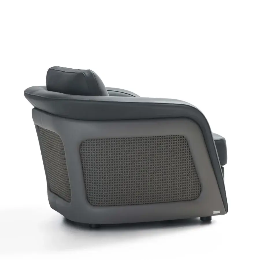 Elegant Mascheroni Bellini Harry lounge chair upholstered in dark gray textile with perforated Vienna straw leather sides