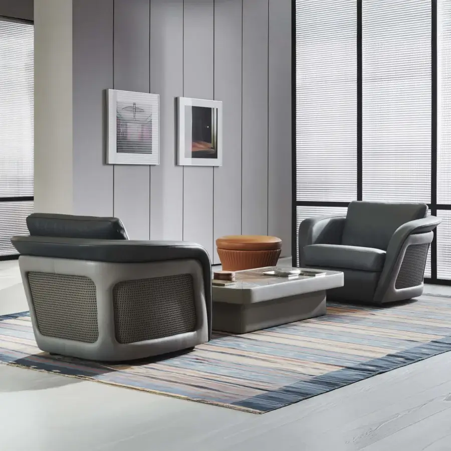 Exclusive Mascheroni Bellini Harry lounge chair with dark gray-blue leather and distinctive Vienna straw detailing crafted in Italy