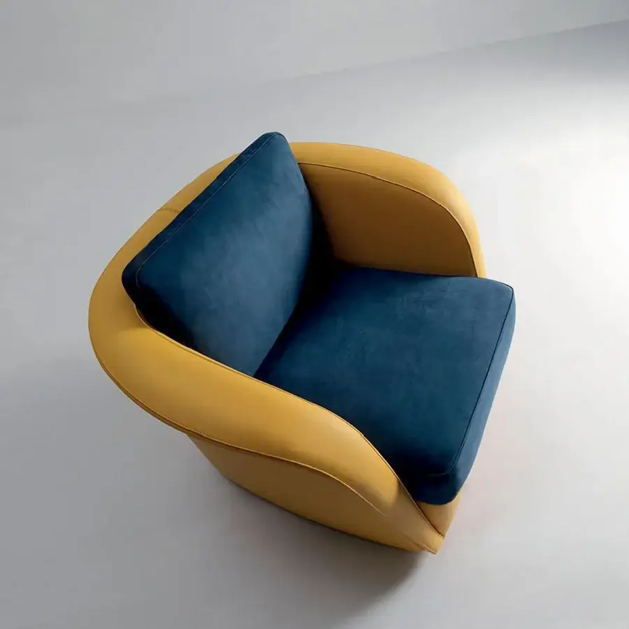 Distinctive Mascheroni Bellini Harry lounge chair in vibrant mustard yellow Vienna straw and teal with a matte finish
