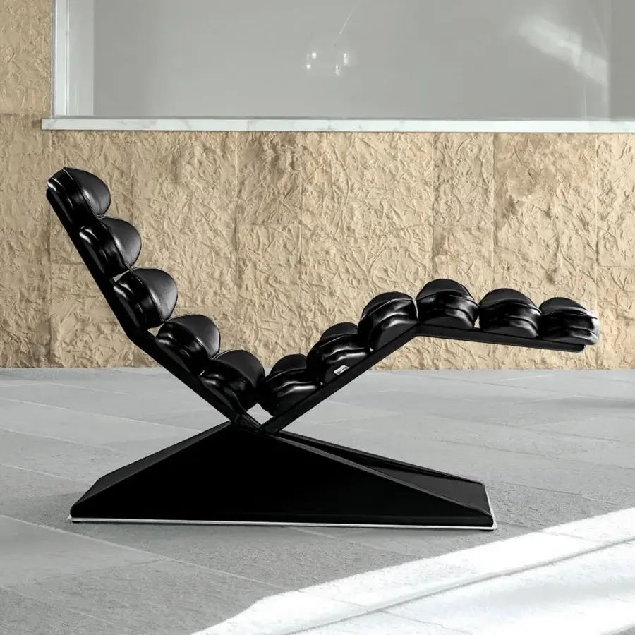 Elegant Mascheroni Concorde lounge chair upholstered in smooth black leather with adjustable reclining seat and steel birch wood frame
