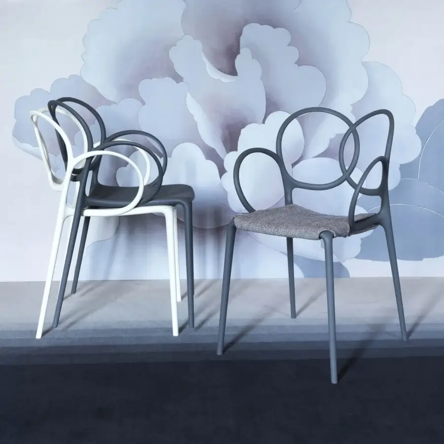Superior Driade Sissi chair molded from glass fiber reinforced copolymer in muted grey-blue with woven textile seat and satin finish