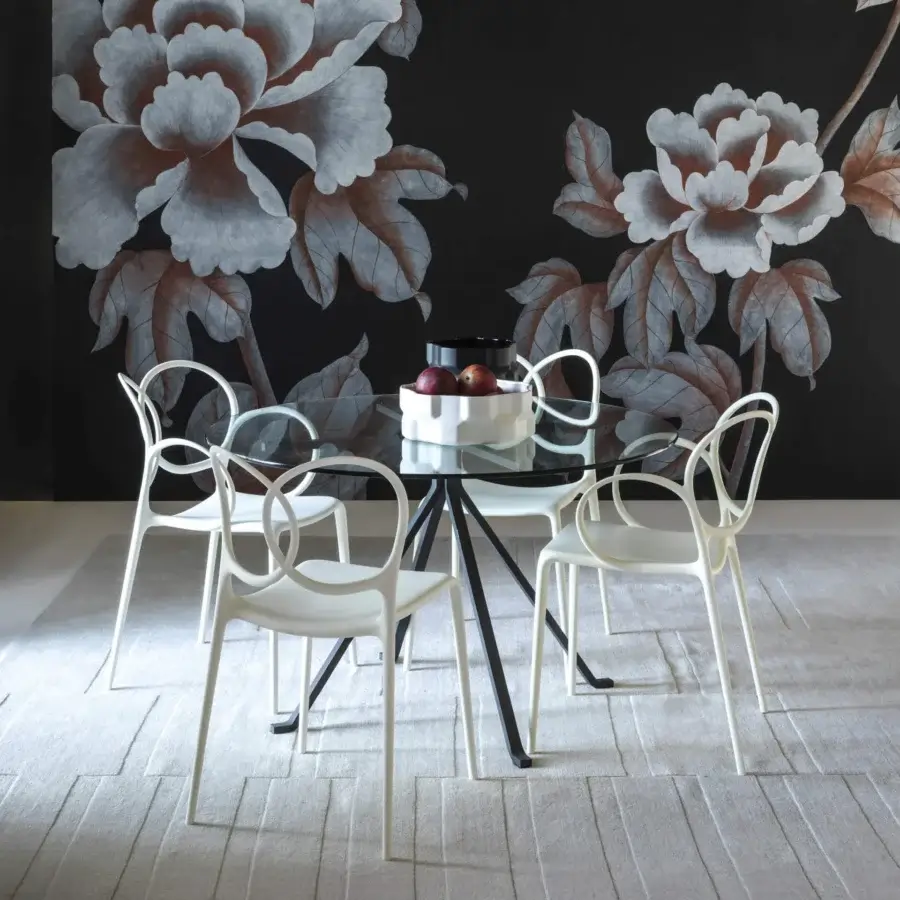 Distinguished Driade Sissi chair crafted from glass fiber reinforced copolymer with a satin sheen and pale tone