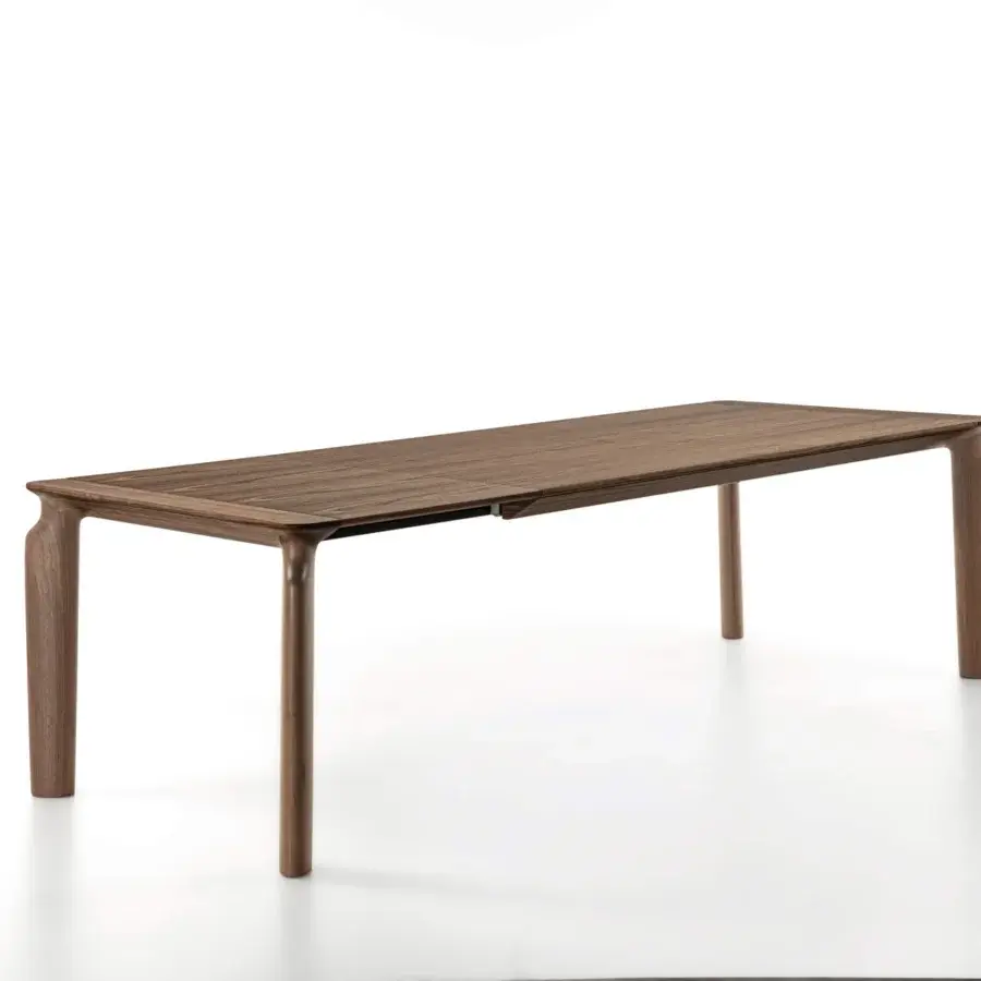 Elegant Porada Amphora table built in solid Canaletta walnut with natural wood grain and a satin sheen