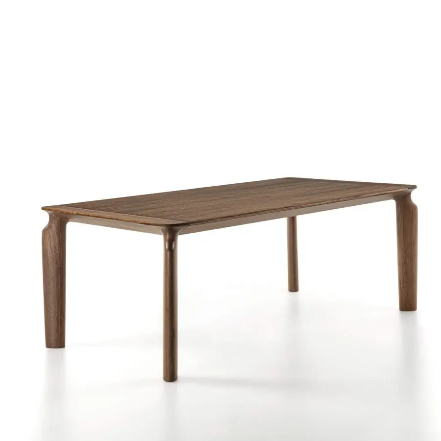 Distinguished Porada Amphora table crafted in solid Canaletta walnut with a smooth satin finish and contemporary design