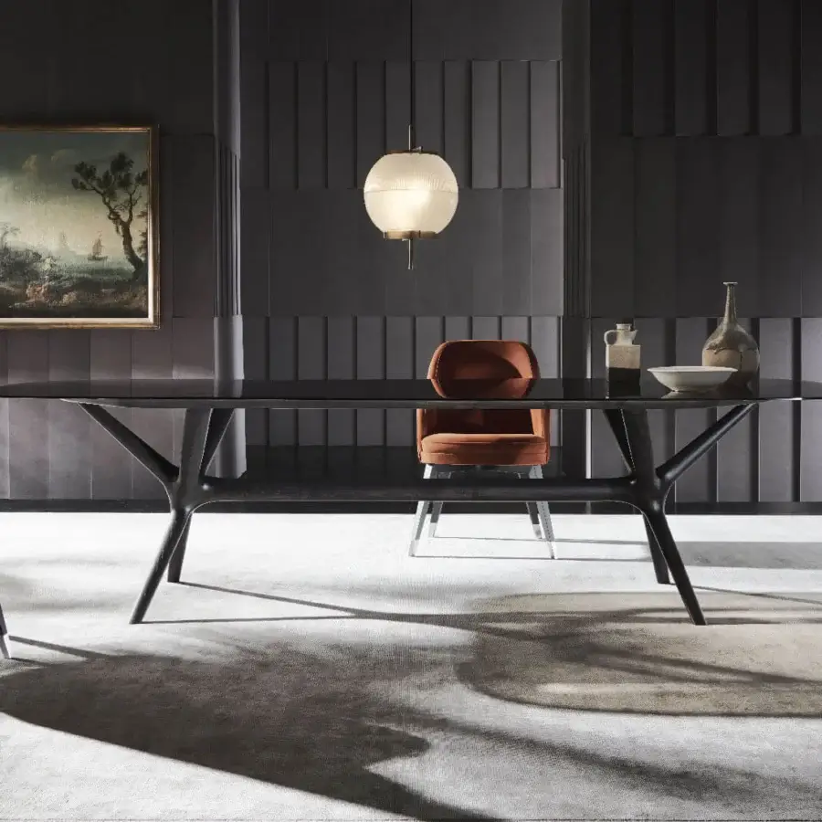 Distinguished Mascheroni Gemma Base armchair upholstered in reddish-brown woven textile with dark gray accents and satin-finish metal legs