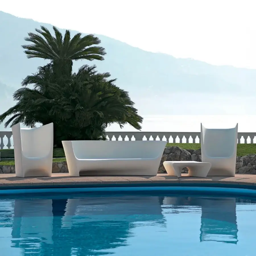 Harmonious Driade Pliè lounge chair crafted in durable polyethylene with a matte finish and fluid lines