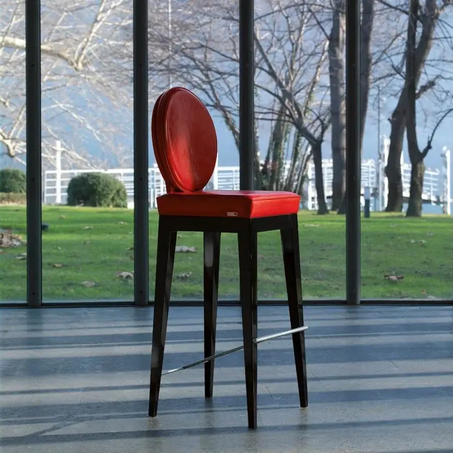 Exceptional Mascheroni Martini bar stool with vibrant red leather upholstery and a shaped birch frame