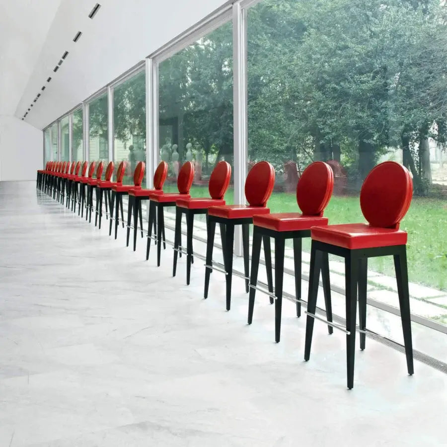 Exceptional Mascheroni Martini bar stool with red synthetic seat and dark matte metal frame built with wood structure