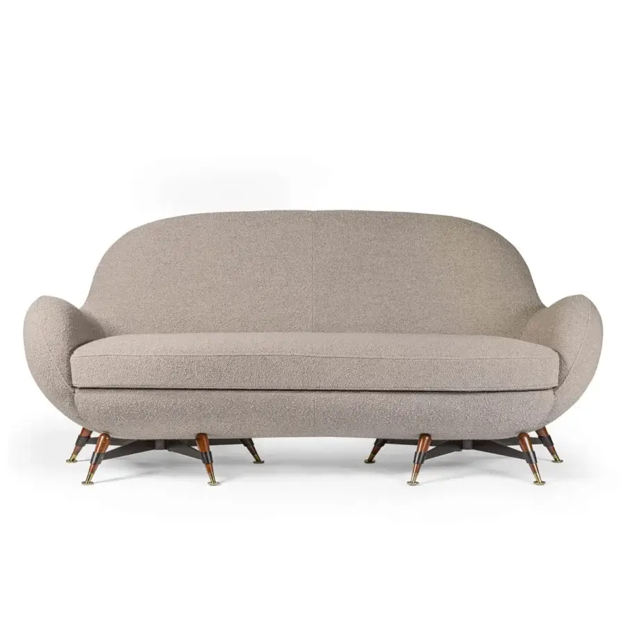 Superior Visionnaire Mercury sofa crafted with stretch fabric and a matte black steel base with brass tips
