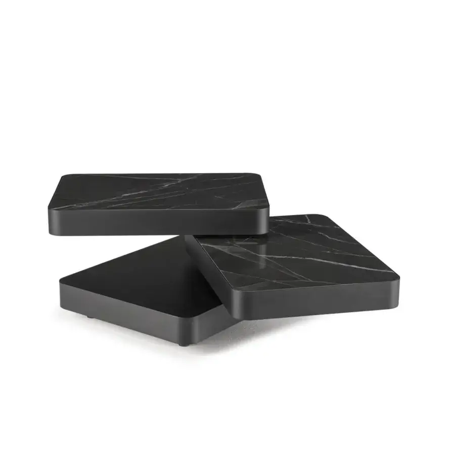 Elegant Naos Aurum coffee table with a black ceramic top displaying delicate white veining and painted frame