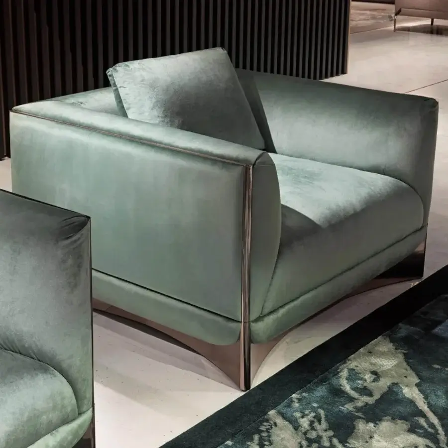Captivating Visionnaire Ca’ Foscari lounge chair with plush grayish-green velvet upholstery and polished stainless steel base