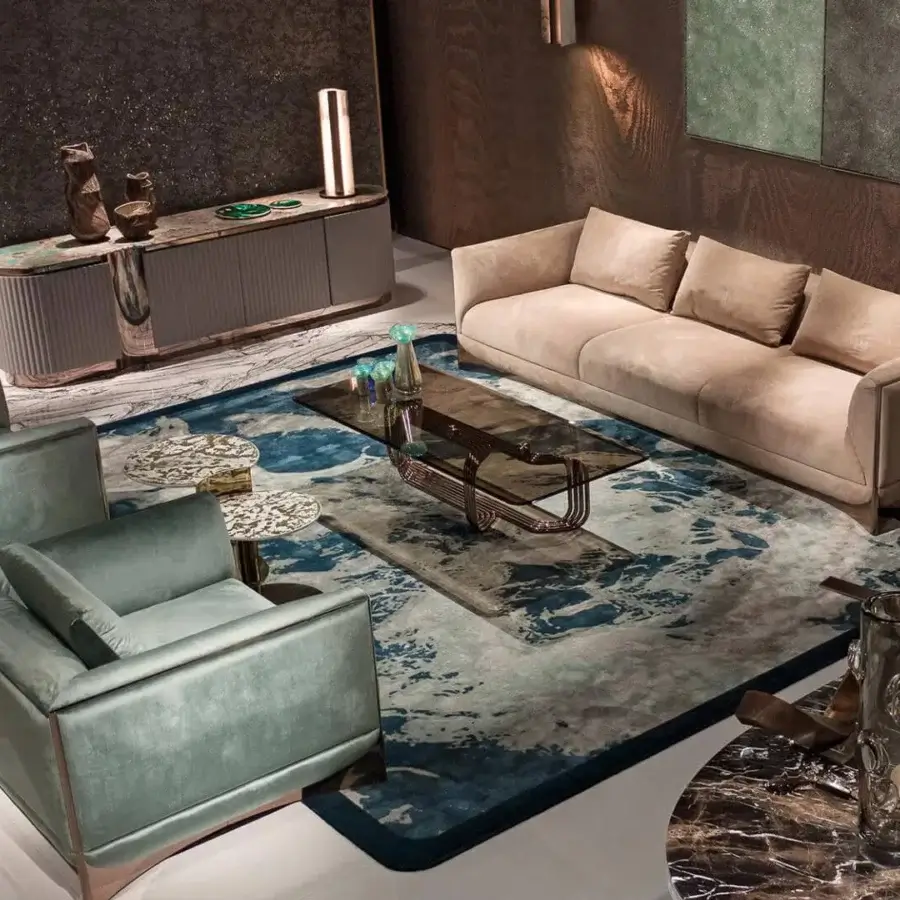 Harmonious Visionnaire Ca’ Foscari lounge chair built with grayish-green textile upholstery and satin wood with polished metal trim