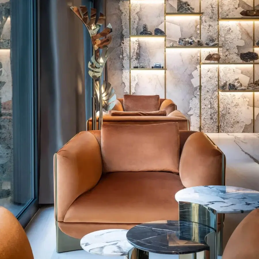 Lavish Visionnaire Ca’ Foscari lounge chair with reddish-brown velvet upholstery and satin finished stainless steel base