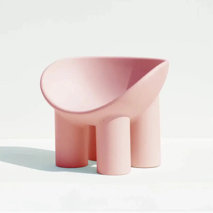 Luxury Driade Roly Poly lounge chair with playfully modern form molded in matte pink polyethylene monoblock