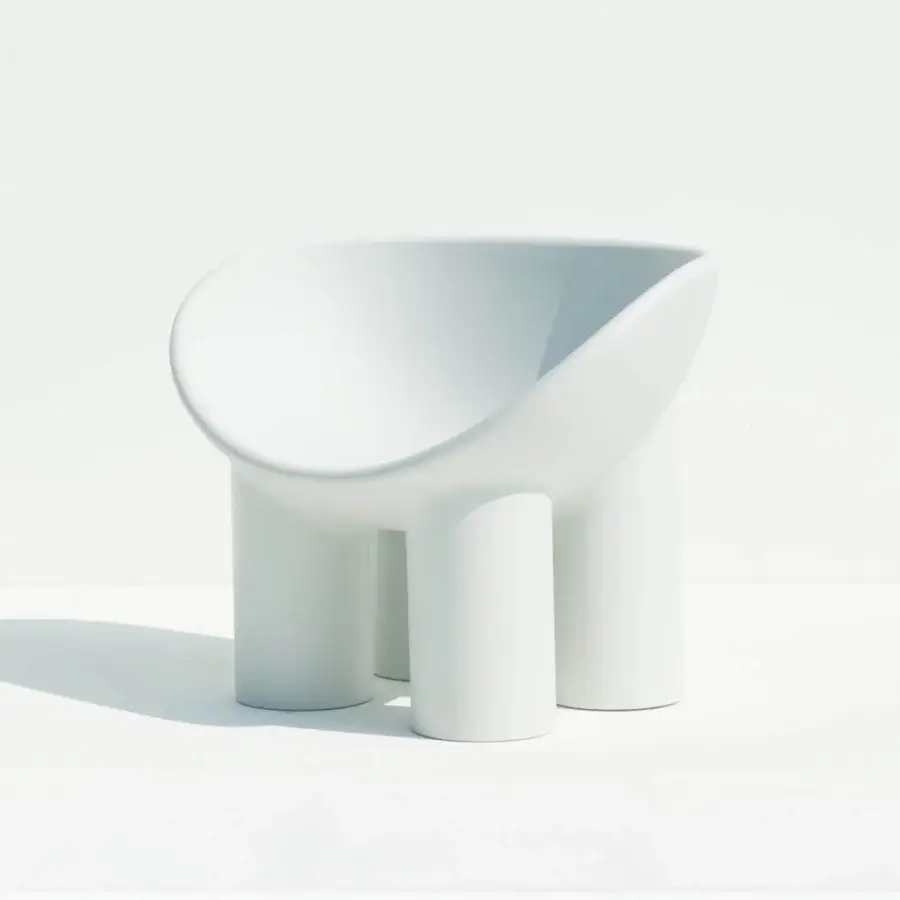 Distinguished Driade Roly Poly lounge chair with architectural form molded in pale blue-grey polyethylene and matte finish