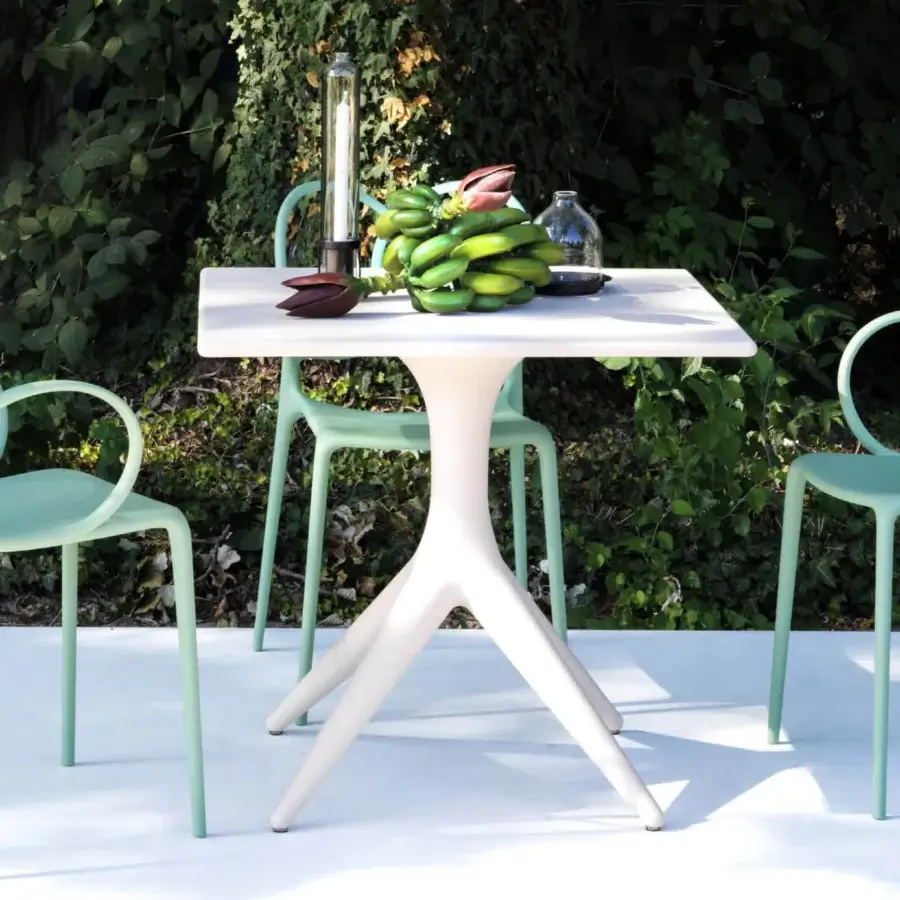 Elegant Driade App Bistrot table crafted in white polyethylene with converging legs and a clean finish