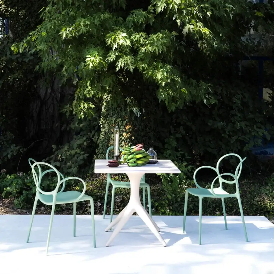 Elegant Driade App Bistrot table crafted in white polyethylene with gracefully curved lines and glossy finish