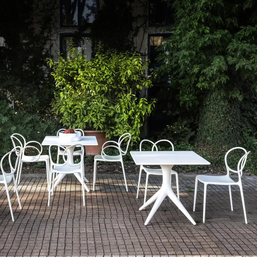Distinguished Driade App Bistrot table crafted in white polyethylene with a smooth matte finish and flared legs