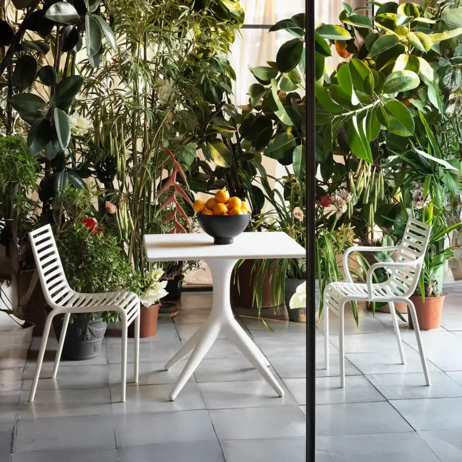 Superior Driade App Bistrot table crafted in white polyethylene with a smooth matte finish and converging legs