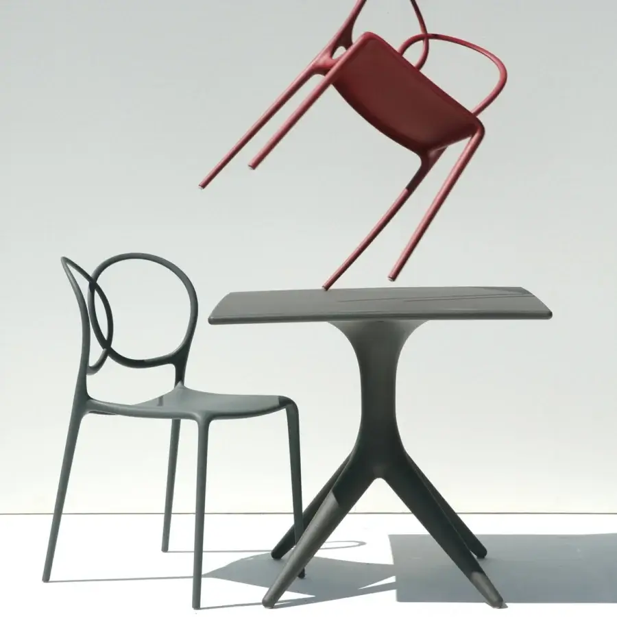 Distinguished Driade App Bistrot table crafted in dark gray polyethylene with a flared pedestal base and matte finish