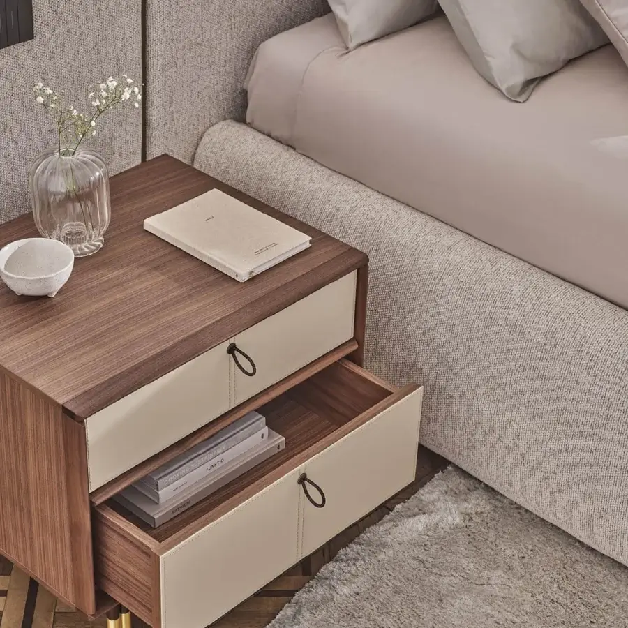 Elegant Porada Bayus Night nightstand built with Canaletta walnut, pale beige drawer fronts and braided leather handles