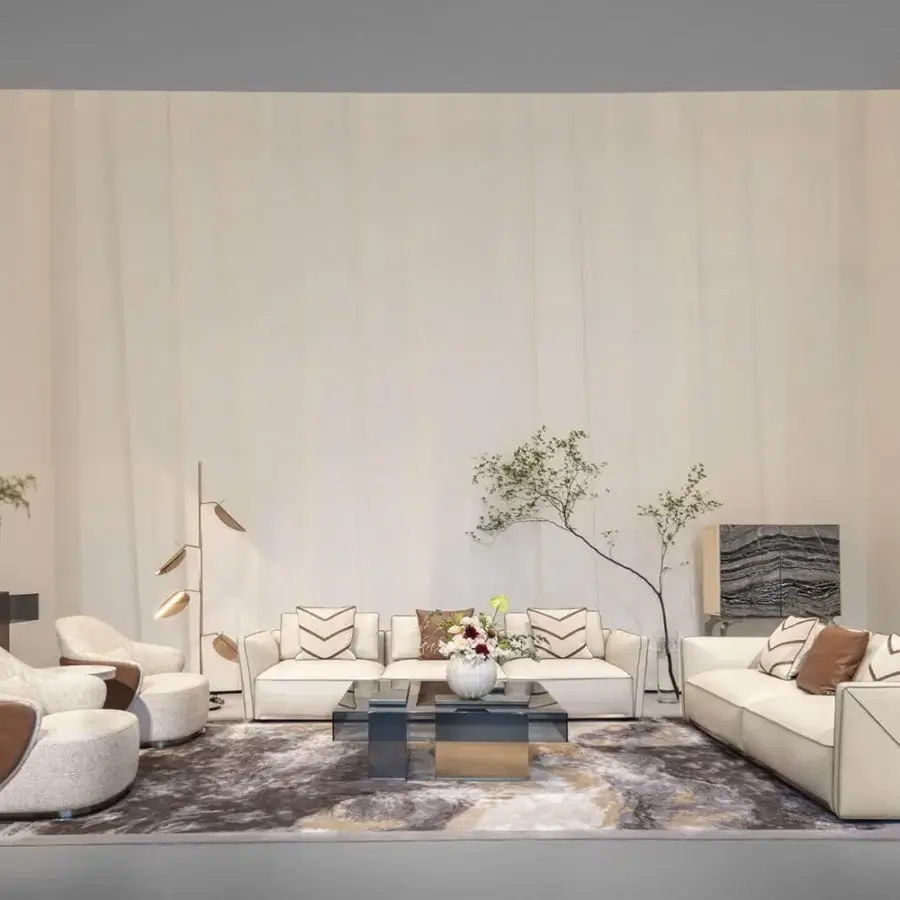 Superior Visionnaire Bastian sofa with light beige woven fabric upholstery and satinized stainless steel friezes