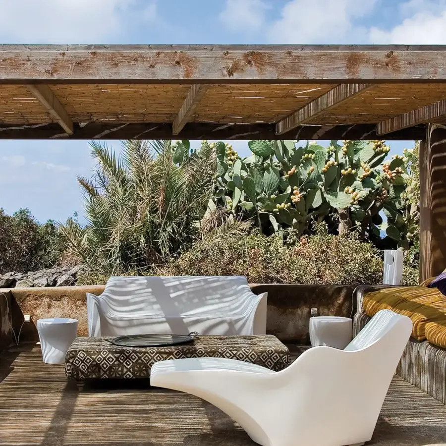 Elegant Driade Tokyo-Pop sofa with organic form crafted in white polyethylene and glossy finish with geometric cushions