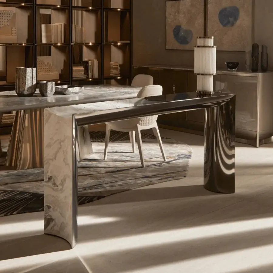 Distinguished Visionnaire Ekos console crafted from cool grey solid marble with polished stainless steel accents and a delicate smoked glass service top