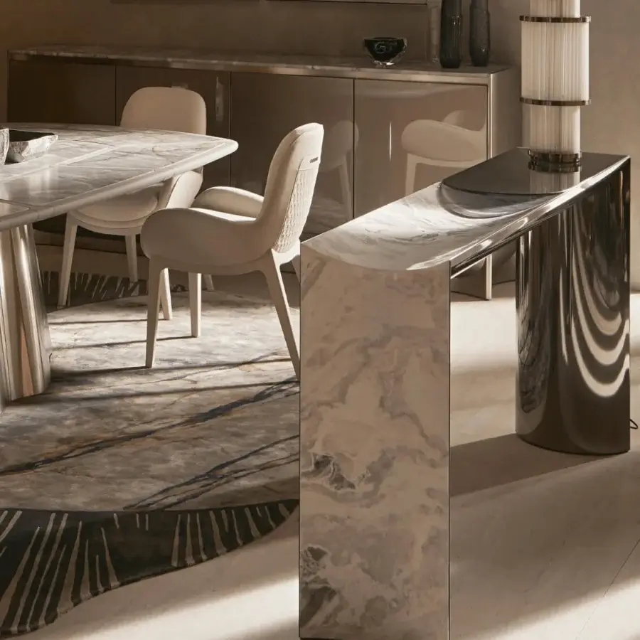 Exclusive Visionnaire Ekos console crafted from solid white marble with grey and beige veining and polished stainless steel accents