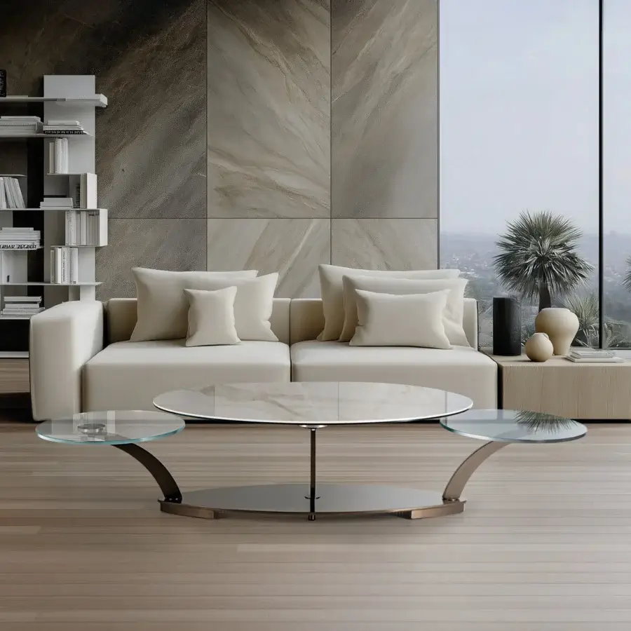 Superior Naos Cocoon coffee table with sculpted form and synchronized opening mechanism in polished silver-toned painted steel and glass tops