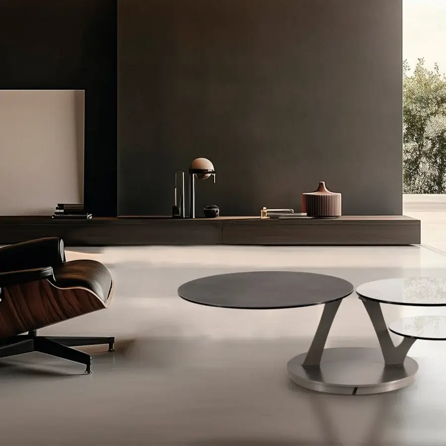 Distinguished Naos Bio coffee table with synchronized revolving round tops in dark-toned and clear glass with a satin silver-grey metal base