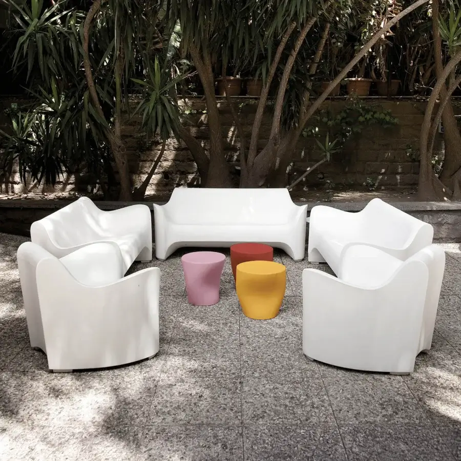 Distinguished Driade Tokyo-Pop coffee table set sculpted from glossy polyethylene with a vibrant orange hue and fluid asymmetric form