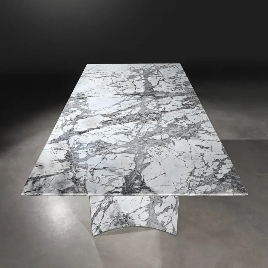 Superior Visionnaire Kerwan table with sculpted white marble and curved polished stainless steel base