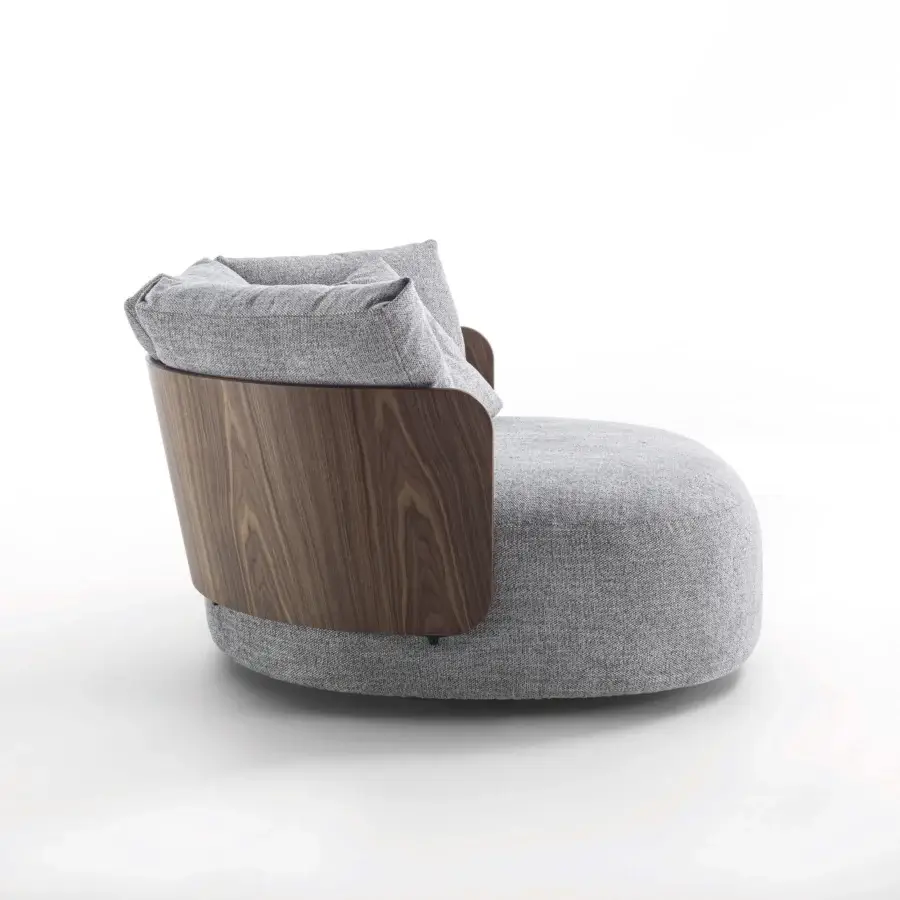 Elegant lounge chair with beautifully grained wood shell and sumptuously textured muted gray textile upholstery in satin finish