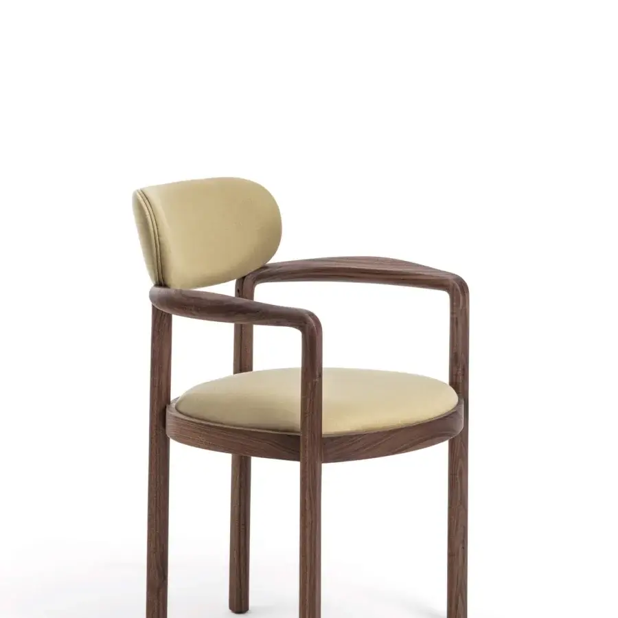 Lavish Porada Dione chair reimagines a bucket seat crafted with solid canaletta walnut and neutral beige upholstery with a satin finish