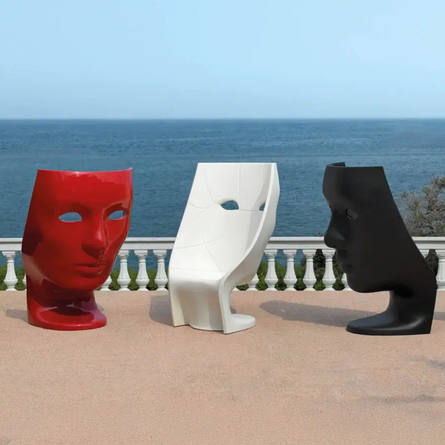 Captivating Driade Nemo Lounge chair sculpted from red polyethylene with a glossy exterior presents an iconic classical visage