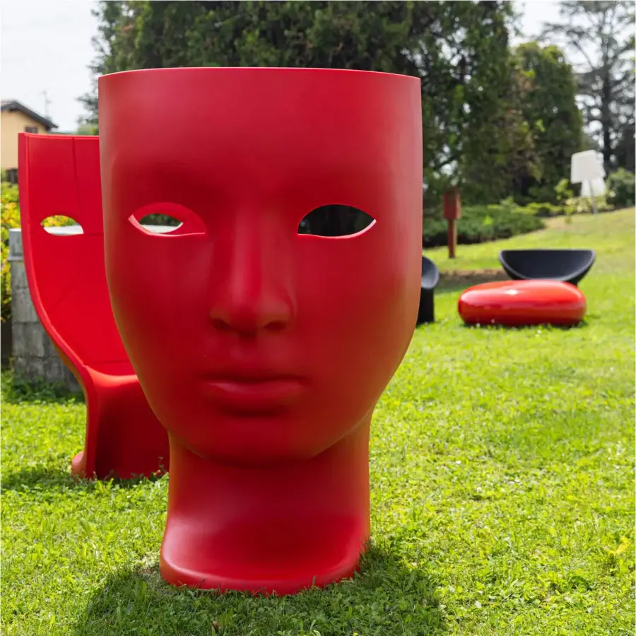 Distinctive Driade Nemo Lounge chair sculpted from glossy red polyethylene embodies modern artistry as an immersive sculpture