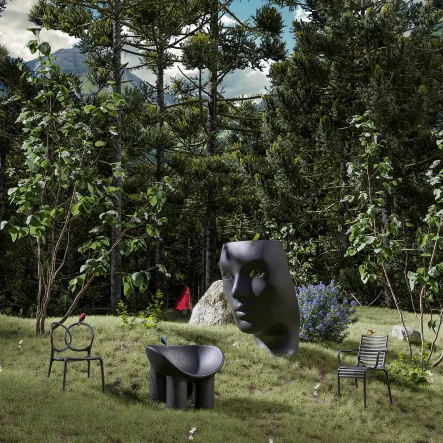 Captivating Driade Nemo Lounge chair sculpted from charcoal gray polyethylene with a matte finish