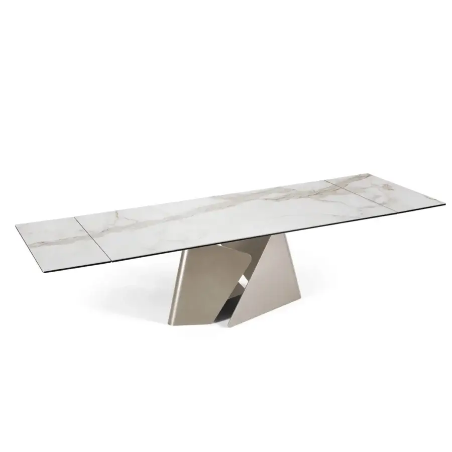 Exceptional Naos Fusion table with ceramic tabletop displaying a white marble-look and glossy sheen with a muted gold painted metal base