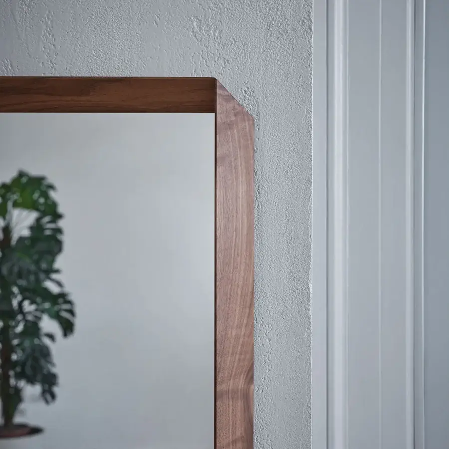 Distinguished Porada Fortyfive mirror crafted in solid canaletta walnut with a smooth satin finish