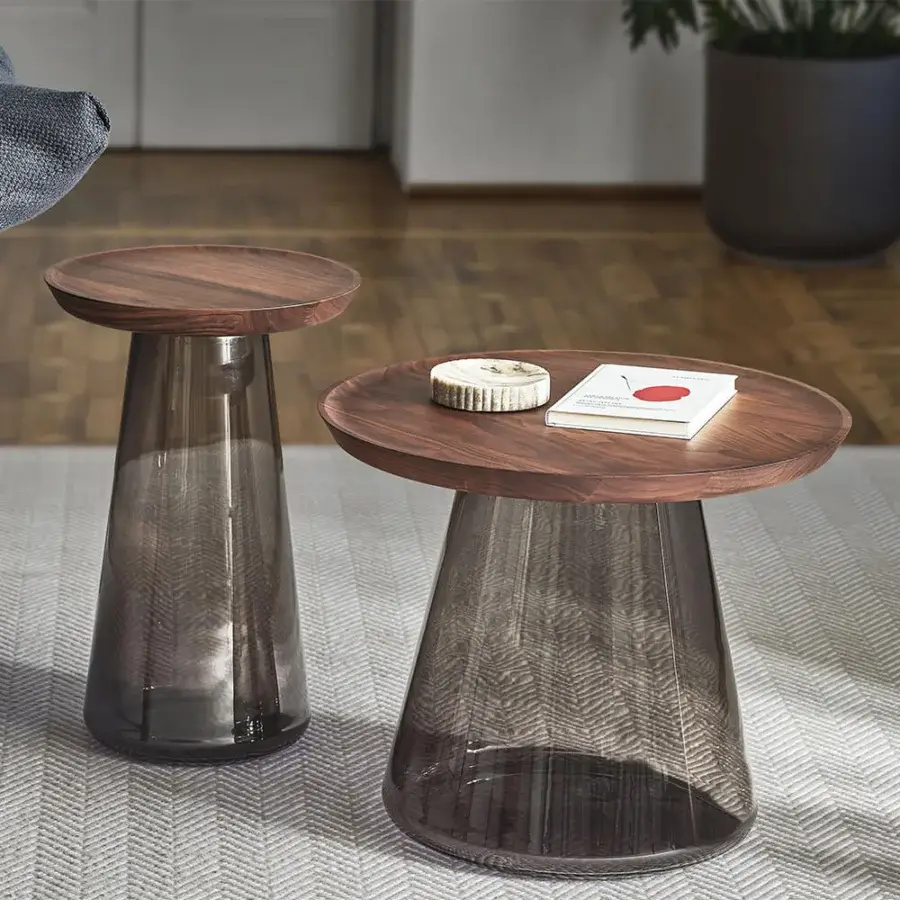 Distinguished Porada Jig side table with a solid canaletta walnut tabletop and translucent smoky grey-brown blown Murano glass base crafted with a satin finish