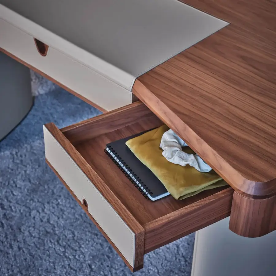 Exceptional Porada Moty vanity desk built with solid canaletta walnut exhibiting satin finish and tactile off-white leather upholstery