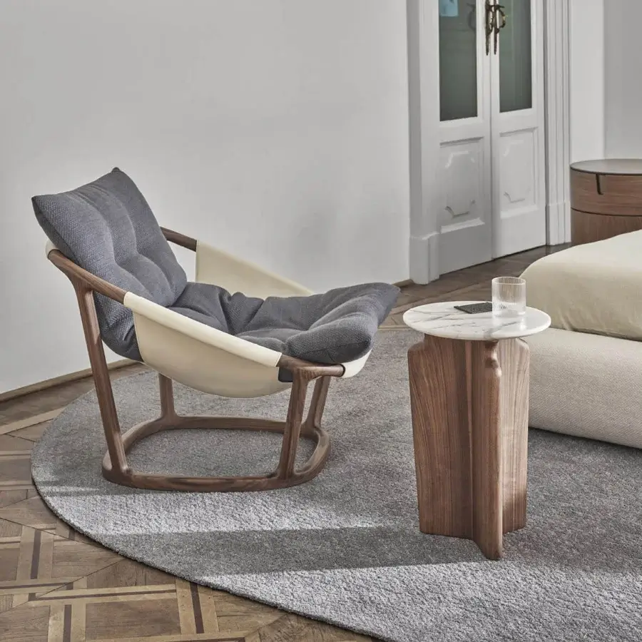 Exceptional Porada Podi side table with sculptural canaletta walnut base and smooth light-toned marble tabletop in satin finish