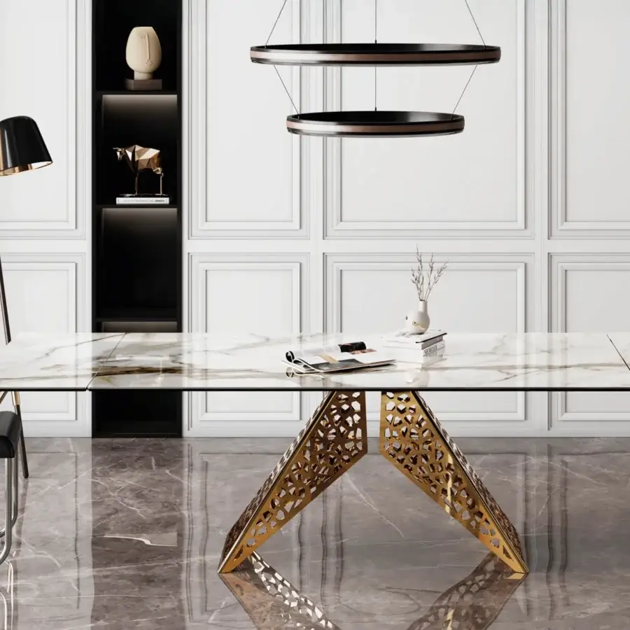 Lavish Naos Coliseum table with a white and gray marbled ceramic surface and gilded gold geometric base