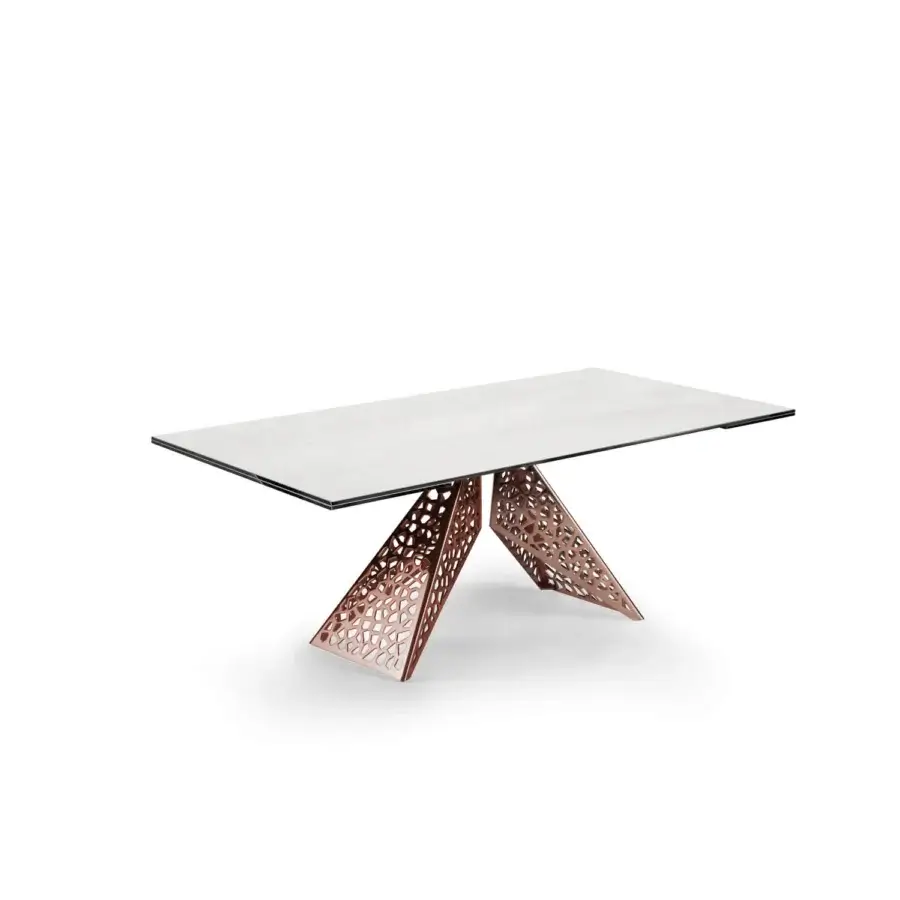 Superior Naos Coliseum table with reddish metal base and mottled grey ceramic tabletop exhibiting geometric design