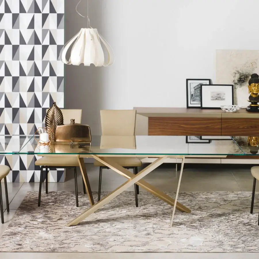 Superior Naos double extendable dining table with glass top and painted gold-tone metal base in walnut finish