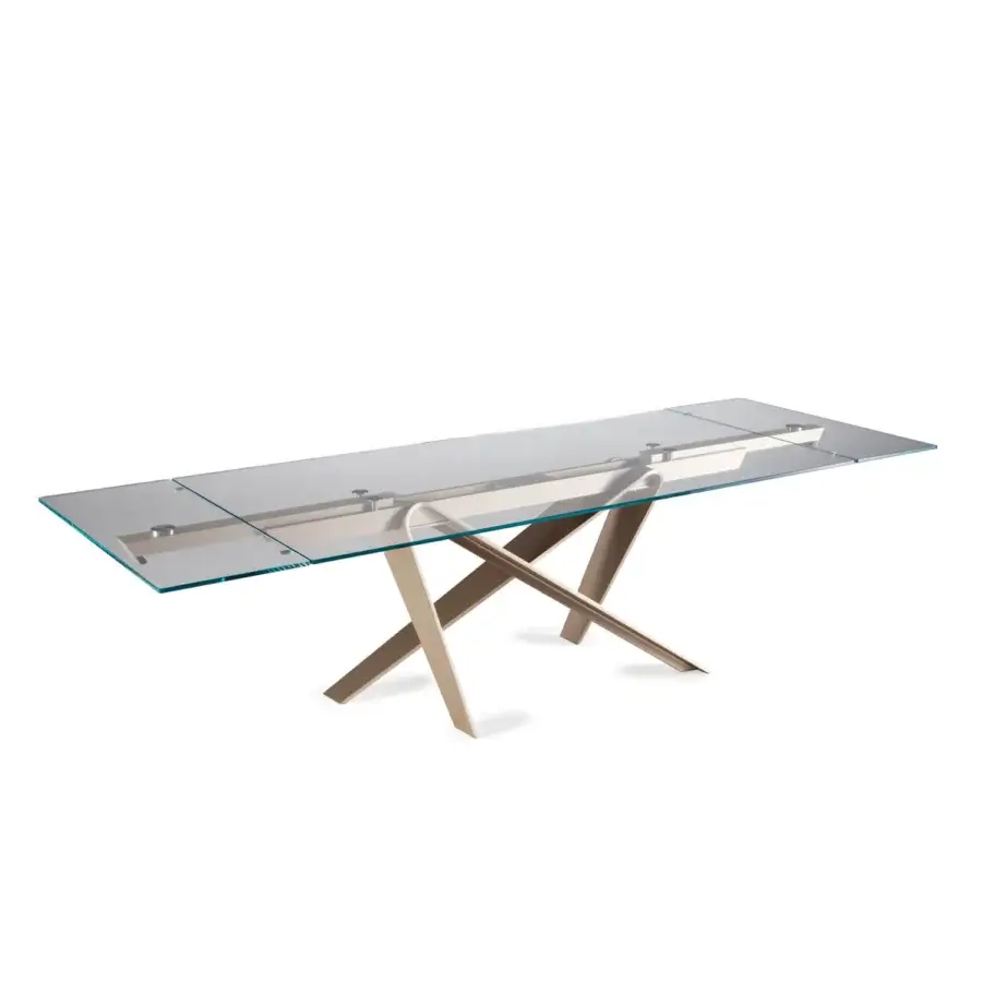 Distinguished Naos double extendable dining table with glass tabletop and satin light brown wood X-shaped base built with a silver-toned extension mechanism