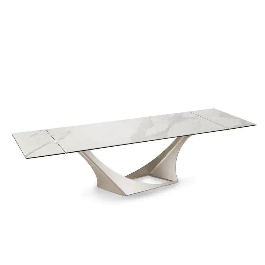 Captivating Naos Efesto table with ceramic tabletop exhibiting white and grey veining and a glossy finish crafted in satin gold tone metal