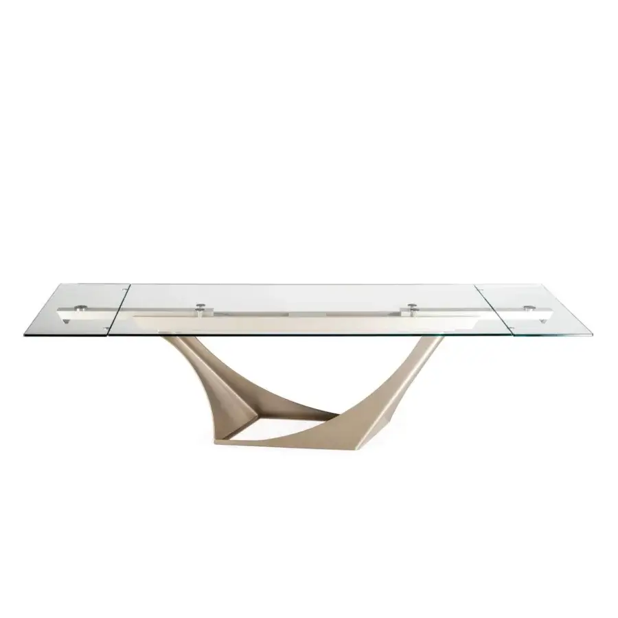 Distinguished Naos Efesto table with transparent glass tabletop and sculpted painted metal base in muted gold finish