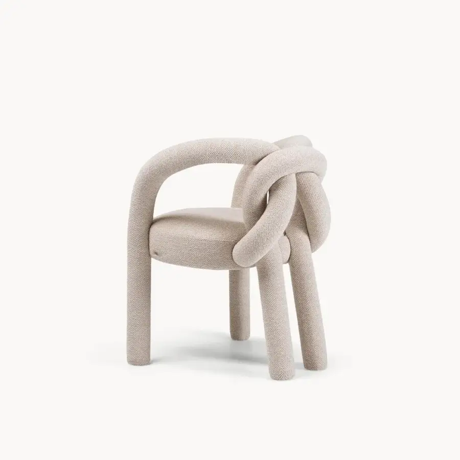 Captivating Visionnaire Shibari chair with textured stretch fabric and uniquely sculpted enveloping form in neutral beige